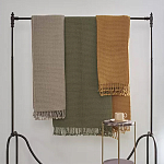 Плед из шерсти зеленого цвета с бахромой Waffle Comfort варинант исполнения - 4 | Loft Concept в Красноярске