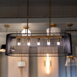 Люстра подвесная овальной формы с металлическим решетчатым абажуром матово-черного цвета и 5 лампами Kichler варинант исполнения - 7 | Loft Concept в Красноярске